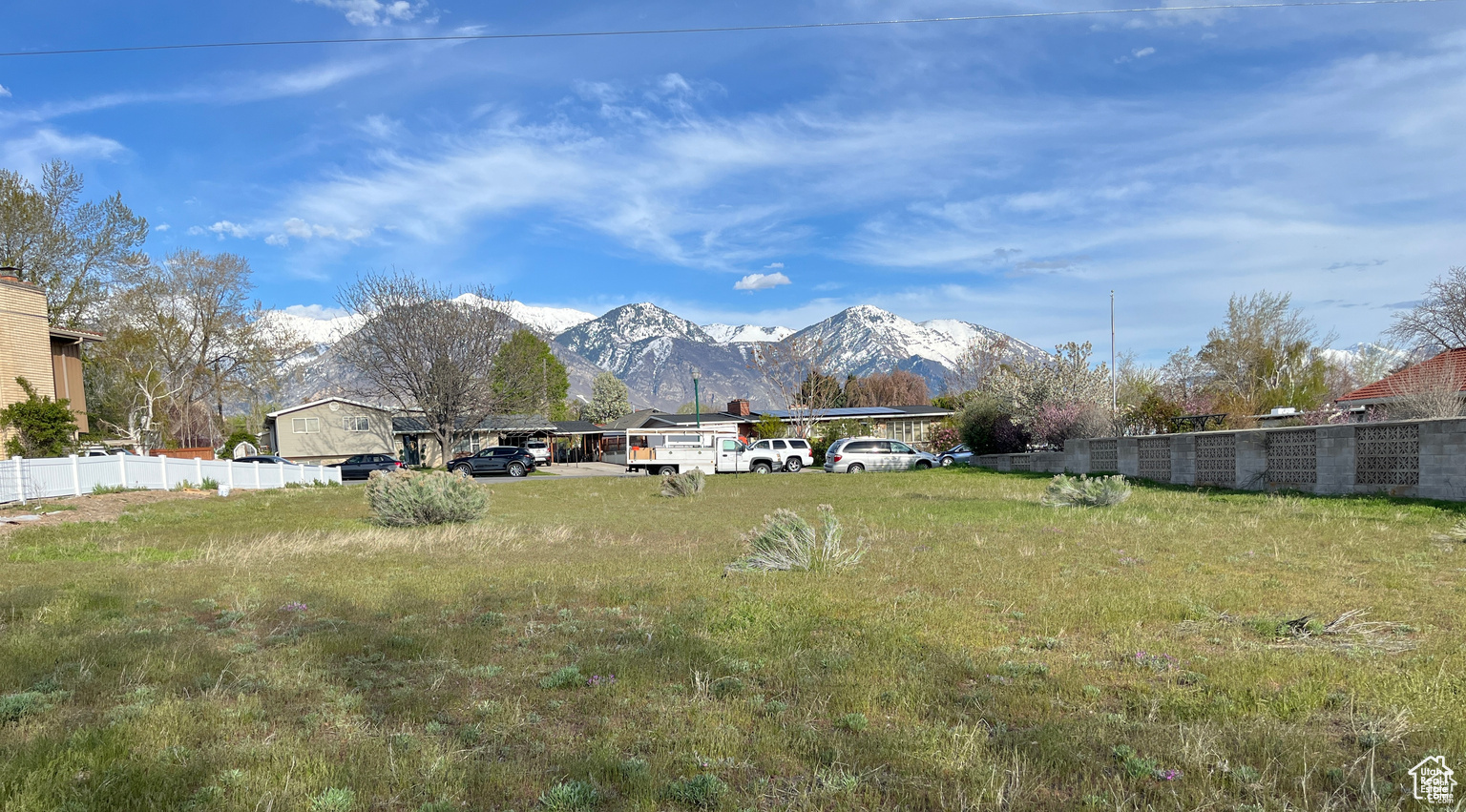 Build your dream home in Orem with one of the only view lots available in the city. This lot has views of the mountains from the front and views of the lake from the back. The lot is flat and ready to build on with water, sewer and power already stubbed and available. The property is located in an established neighborhood on the Orem west bench and has easy access to amenities, K-12 schools, UVU, BYU, restaurants, freeway access and shopping. Bring your own builder and custom plans.