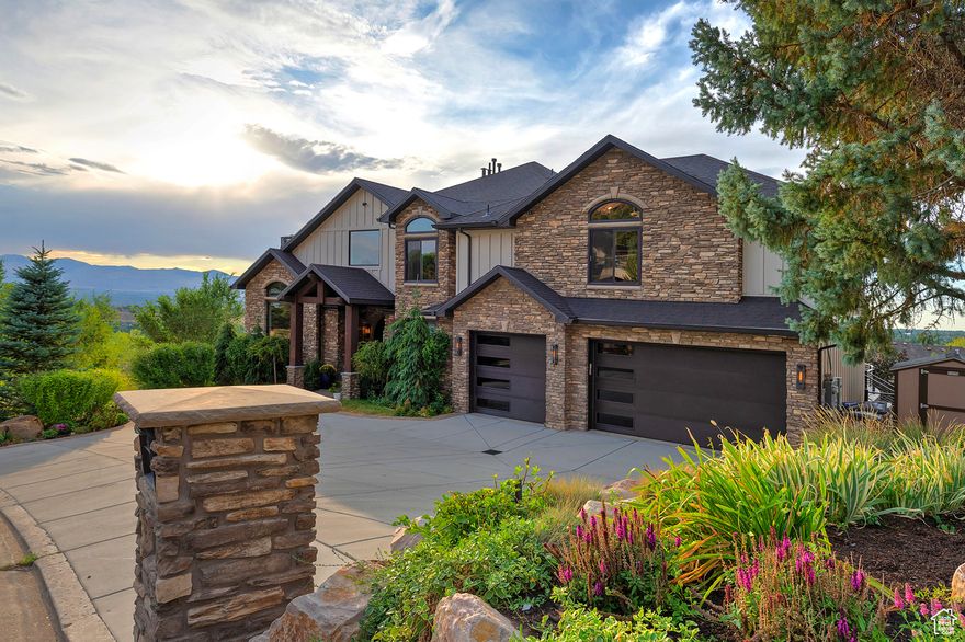 Spectacular Draper Luxury Home with One-of-a-Kind Views Better than new, this fully renovated masterpiece offers unparalleled panoramic golf course and mountain views through oversized windows and expansive Caribbean doors. Enjoy over 2,500 sq ft of decks and covered patios, complete with a relaxing hot tub, tranquil water feature, and mature fruit trees. Inside, the dramatic two-story granite fireplace anchors the open living area, while the gourmet kitchen impresses with high-end finishes, a hidden pantry, and premium appliances. The walk-out lower level boasts a state-of-the-art theatre room and direct backyard access, perfect for entertaining. A backup generator provides added peace of mind. Every detail has been crafted for luxury, comfort, and entertaining, making this home a rare find in Draper. *Square footage provided as a courtesy. Buyer is advised to obtain independent measurements and verify all information.*