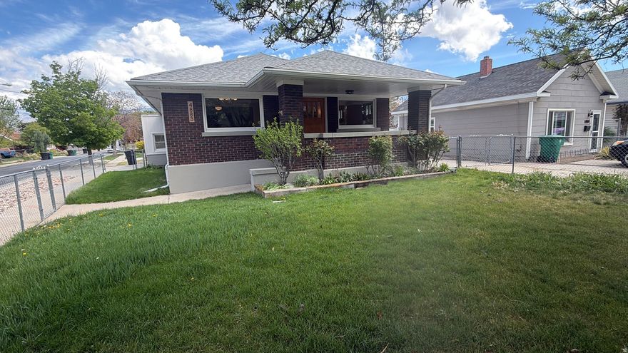 This beautifully remodeled 3-bedroom, 2.5-bath home perfectly blends classic charm with modern upgrades, all in a highly desirable location near the IMC medical plaza.  Step inside to find a warm, inviting main level featuring refinished hardwood floors, abundant natural light, and original woodwork that adds character you simply can't replicate. The open living and dining spaces flow seamlessly into a fully updated kitchen complete with custom cabinetry, quartz countertops, tile backsplash, and a high-end gas range, which is perfect for both everyday living and entertaining.  The bathrooms have been thoughtfully redesigned with stylish tile work, modern vanities, and quality fixtures throughout. The primary suite offers a comfortable retreat, while the additional bedrooms provide flexibility for family, guests, or a home office.  Downstairs, the finished basement offers a spacious second living area along with additional bedroom space.  Outside, enjoy a charming covered front porch and a fully fenced yard with mature landscaping and an attached 2-car garage.