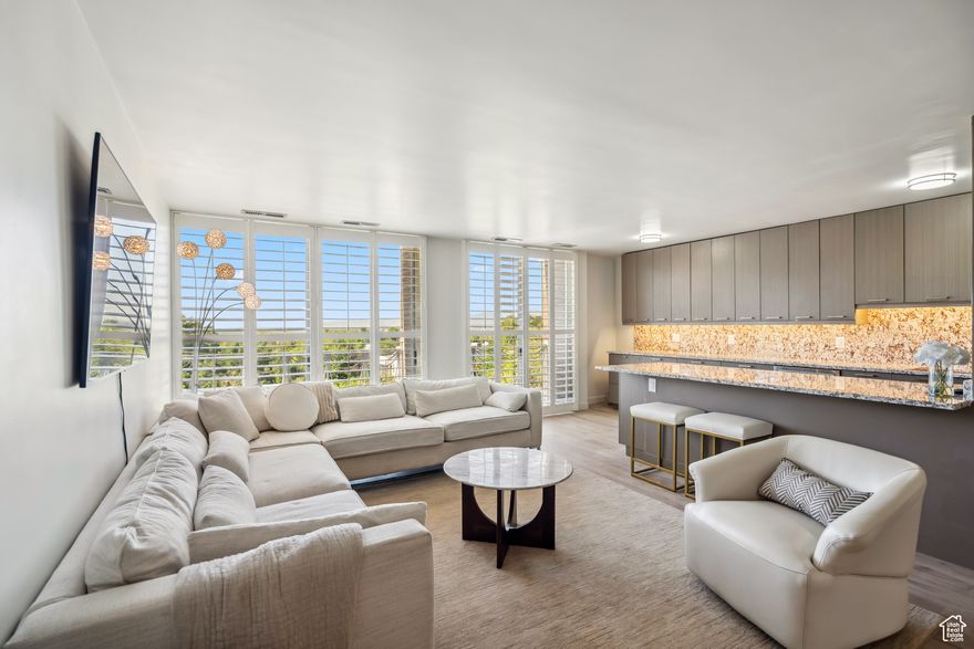 Stunning, fully renovated 2BD/2BA condo in the iconic Bonneville Tower with breathtaking south and west-facing views of Salt Lake City and the Wasatch mountains-plus a front-row seat to historic South Temple street! Valuable floor-to-ceiling windows.  This turnkey unit has been completely transformed from top to bottom with brand-new appliances, floors, fixtures, and finishes throughout. The large, open-concept kitchen and dining area are perfect for entertaining, while the living space is bathed in natural light and framed by plantation shutters for style and privacy.  Enjoy the comfort of generous living spaces, modern elegance, and city views from every window. This building offers a secure, quiet atmosphere with a pool, gazebo, and outdoor BBQ. It is located 1 mile from City Creek's downtown amenities and 2 miles from the U of U with multiple transportation options.  Experience the ideal blend of luxury, light, and location. Are you looking for even more space? Unit 4A is also for sale, and can be combined with 4B!