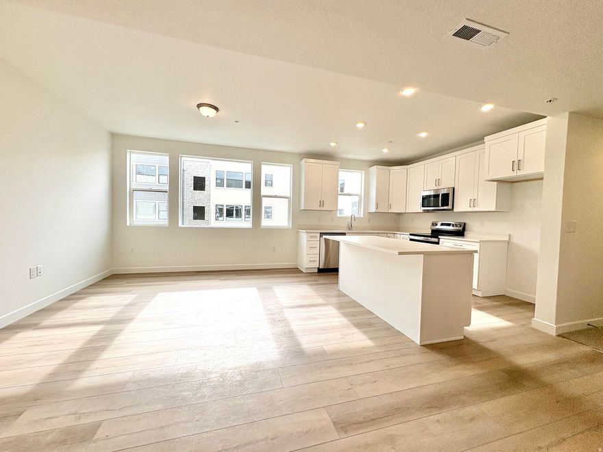 Gorgeous Newly Built Condo at Jordan Bluffs- Fully Completed & Move-In Ready!  Enjoy modern, low-maintenance living in this beautifully finished brand-new 2-bed, 2-bath condo located in the desirable Jordan Bluffs community. This home is fully completed, no construction wait, and ready for you to move in today!  Step inside to a bright, open floor plan featuring stylish upgrades throughout, including wide-plank laminate flooring, sleek white cabinetry, quartz countertops, and stainless steel appliances. The spacious primary suite offers a private en-suite bathroom and a generous walk-in closet for added comfort.  Perfectly situated in the center of the valley, this awesome location offers unbeatable access to shopping, dining, parks, schools, and entertainment, plus convenient commuter routes with quick freeway access. 3 Bedroom unit also available. Many units built and under construction, or build your own and choose colors, fixtures and finishes! Call for a private showing today!