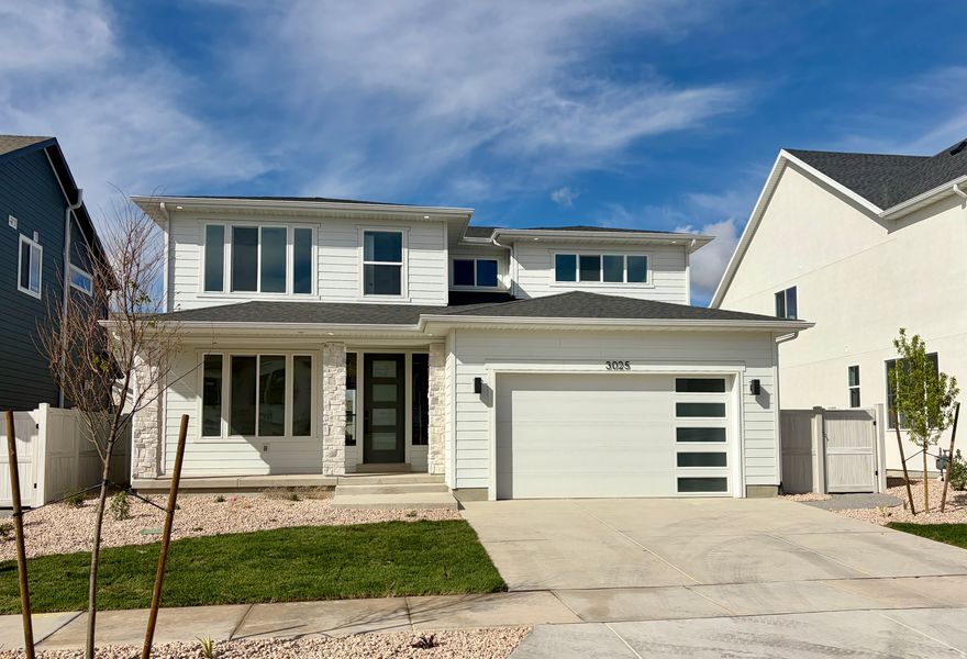 The Keystone is a stunning two-story home with over 3,500 sq. ft. of space, offering both grandeur and comfort. It features a study at the entrance, leading into an open-concept kitchen and living room with a wall of windows and a large sunroom. The main floor also includes a mudroom, powder room, and spacious pantry. Upstairs, a loft separates the primary suite from the other two bedrooms. The primary suite serves as a peaceful retreat with a luxurious bathroom-including a walk-in closet, while the other bedrooms share a full bathroom. Natural light fills the home, creating a calm and refined atmosphere. This home is located in Firefly, the master-planned community built specifically for kids to live life unplugged. Stop fighting over screen time and start reconnecting in an environment engineered to encourage play. Firefly isn't just a neighborhood, it's a 350+ acre network of parks, trails, and amenities designed to inspire adventure and activity. The day you move in, your kids will be enjoying the skate and wheels park, the bike pump track, the downhill mountain bike course, pickleball and basketball courts, neighborhood playgrounds, and miles of trails. Is your child shy? Firefly has the region's only full-time Activities Director curating weekly activities and events for all ages, encouraging families and neighbors to connect in nature. Located in Eagle Mountain, Firefly is an easy commute to the Silicon Slopes, with close proximity to shopping and entertainment. Just 40 miles south of Salt Lake City and 30 miles north of Provo, it's one of Utah County's fastest-growing cities. Book a tour of this beautiful Candlelight home, explore all the amenities, and see for yourself why Firefly is the best place in Utah to raise your kids.