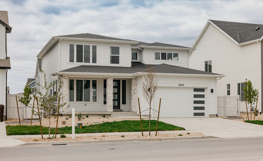 The Keystone is a stunning two-story home with over 3,500 sq. ft. of space, offering both grandeur and comfort. It features a study at the entrance, leading into an open-concept kitchen and living room with a wall of windows and a large sunroom. The main floor also includes a mudroom, powder room, and spacious pantry. Upstairs, a loft separates the primary suite from the other two bedrooms. The primary suite serves as a peaceful retreat with a luxurious bathroom-including a walk-in closet, while the other bedrooms share a full bathroom. Natural light fills the home, creating a calm and refined atmosphere. This home is located in Firefly, the master-planned community built specifically for kids to live life unplugged. Stop fighting over screen time and start reconnecting in an environment engineered to encourage play. Firefly isn't just a neighborhood, it's a 350+ acre network of parks, trails, and amenities designed to inspire adventure and activity. The day you move in, your kids will be enjoying the skate and wheels park, the bike pump track, the downhill mountain bike course, pickleball and basketball courts, neighborhood playgrounds, and miles of trails. Is your child shy? Firefly has the region's only full-time Activities Director curating weekly activities and events for all ages, encouraging families and neighbors to connect in nature. Located in Eagle Mountain, Firefly is an easy commute to the Silicon Slopes, with close proximity to shopping and entertainment. Just 40 miles south of Salt Lake City and 30 miles north of Provo, it's one of Utah County's fastest-growing cities. Book a tour of this beautiful Candlelight home, explore all the amenities, and see for yourself why Firefly is the best place in Utah to raise your kids.