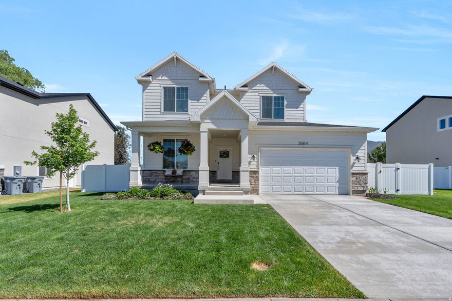 Welcome to 2664 W Maple Street, a beautifully designed, nearly brand-new home featuring a fully finished basement with 9-foot ceilings downstairs and on the main level. With 5 spacious bedrooms, 3.5 bathrooms, and 3 family rooms, this stunning property offers open and airy living spaces perfect for entertaining and family gatherings. Located in the heart of Mapleton, with charming curb appeal and an amazing layout, it's surrounded by parks throughout the neighborhood, making it the perfect place to call home! Don't miss your chance to make it yours!    Square footage figures are provided as a courtesy estimate only and were obtained from appraisals.  Buyer is advised to obtain an independent measurement.
