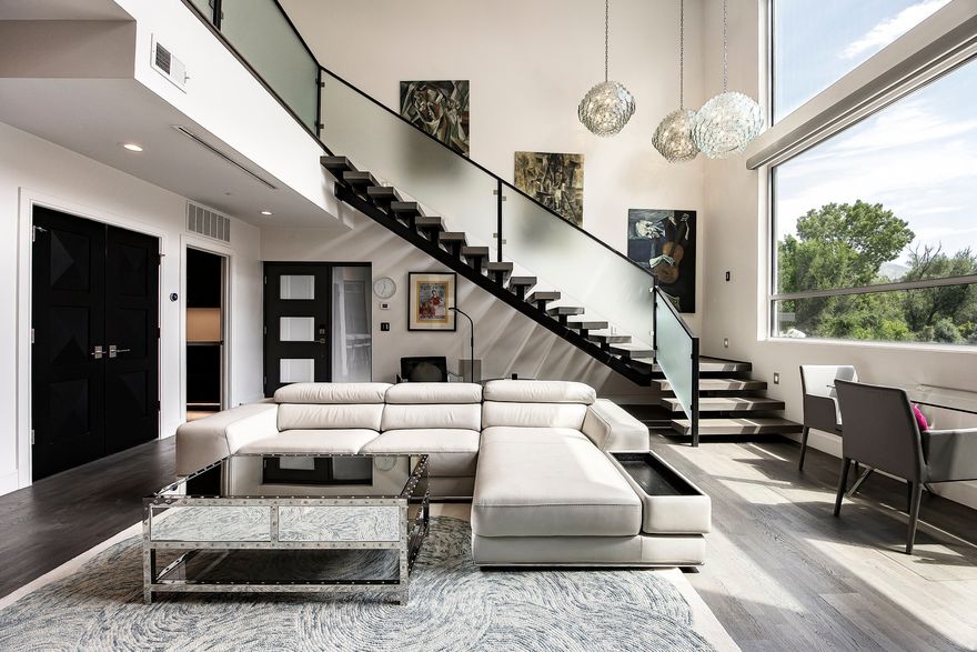 Step into timeless elegance in the heart of Sugar House. This refined residence offers a rare blend of sophistication and urban convenience, perfectly situated just moments from the serenity of Sugar House Park. Enjoy morning walks beneath mature trees, peaceful lake views, and the vibrant energy of a walkable community-all just steps from your door. Inside, high-end finishes abound: sleek quartz countertops, custom cabinetry, and rich flooring elevate every inch of the living space. Secure building access and private, covered parking provide peace of mind, while large windows bathe the interior in natural light and frame picturesque treetop views. Ideally located with quick access to I-80 and I-215, and just minutes from the University of Utah and Westminster College, this is a rare opportunity to live where elegance, convenience, and lifestyle beautifully converge.