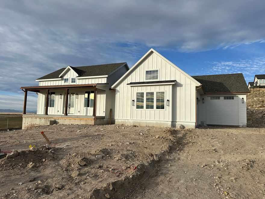 Beautiful brand-new construction on half acre lot in highly sought-after Arrival Master Plan! The era of large lots like this is coming to an end. Land costs have made it cost-prohibitive to develop more, so get one while you can! The gourmet kitchen boasts double wall ovens, large gas cooktop, upper-level appliances, and an enviable butler's pantry! High quality LVP in common traffic areas.  Ample owner's suite with separate tub and shower.  Offset your mortgage payment or provide private living space for family or friends with the massive 2 bed, 1 bath ADU, complete with its own laundry, ample storage, and separate entrance from its own parking spaces  no, really, this apartment is huge, and it's finished to the same quality level as the main home! Oversized insulated 3-car garage for your vehicles, stuff, and toys.  What's in this home that you can't see? Zip system exterior sheathing and Advantec flooring system: water proof, level and squeak free! But the energy envelope is the best hidden feature, saving you about $150/month in utility costs over "typical" systems: 96% efficient dual stage variable speed HVAC equipment allows for zoning and efficient air flow creating energy savings and preventing noticeable temperature variation in the home (it's super comfortable). And white fiberglass insulation gives you R-50 in the attic (blown in) and R-24 in the walls (BIBS system). You can almost heat it with a candle! 1-year builder warranty comes with.  Make it yours today!