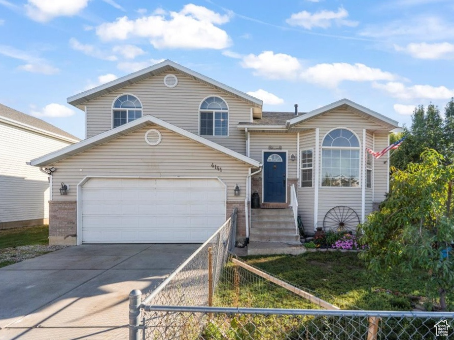 **OPEN HOUSE: Saturday, October 11th, from 10:00 AM Noon** Welcome to this beautiful West Roy home that perfectly blends comfort, efficiency, and style! Enjoy peace of mind with a full solar system, new roof (2020), new A/C and furnace (2022), new water heater (2024), new carpet throughout, and fresh interior paint - offering modern comfort and long-term savings. Step inside to a bright, open living area with vaulted ceilings and a dining space that leads to a private deck with a natural gas hookup - perfect for summer BBQs and relaxing evenings. The home features generously sized bedrooms, three bathrooms, and plenty of storage with built-in shelving in both the basement and garage. A built-in garage workbench adds the perfect space for tools, hobbies, or weekend projects. Outside, you'll love the fully fenced corner lot with a covered patio, storage shed, and plenty of yard space for pets, play, or gardening. Conveniently located within walking distance of the elementary and junior high schools, as well as Meadow Creek Village Park, this home truly checks all the boxes! Square footage figures are provided as a courtesy estimate only and were obtained from county records. Buyer is advised to obtain an independent measurement.