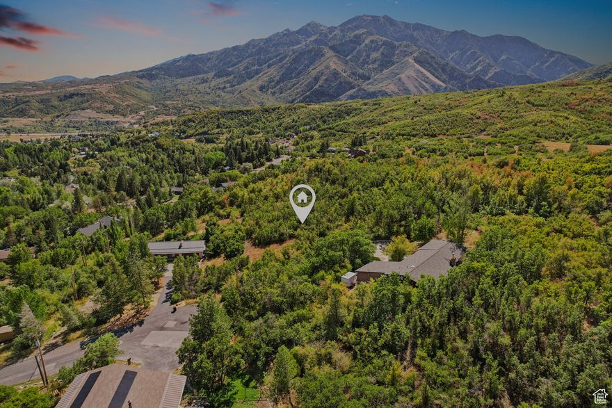 Build your dream home on this stunning lot located in the heart of Mountain Green. Set on a peaceful cul-de-sac with panoramic mountain views, this premium parcel offers the perfect blend of privacy, natural beauty, and accessibility. With no HOA restrictions, you have the freedom to bring your own builder and design a custom home that fits your vision-without unnecessary limitations. All utilities are stubbed and ready, making this an ideal site for a seamless build. Enjoy year-round recreation just minutes away, including Snowbasin Resort, Pineview Reservoir, and endless hiking and biking trails. Don't miss this rare opportunity to own land in one of Northern Utah's most desirable mountain communities.