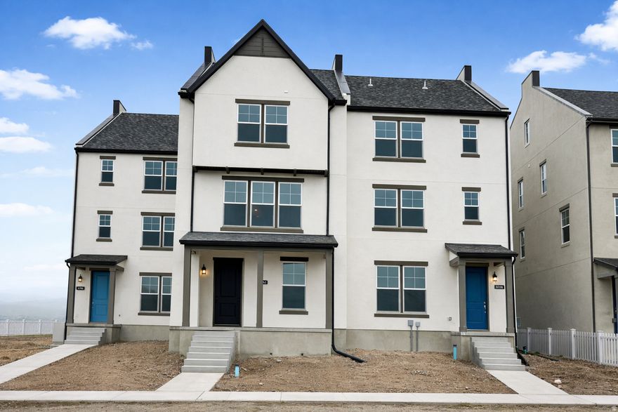 ASK ABOUT OUR LENDER INCENTIVES! BRAND NEW Quick Move-In Olivia plan is just a short walk to Daybreak's Watercourse. Enjoy maintenance free living at its best in this beautifully designed end unit townhome. It features 3 bedrooms, 2.5 baths, plus an unfinished room that can easily be finished as a 4th bedroom and full bath. The open-concept kitchen and family dining area offer generous space for entertaining, filled with natural light throughout. Extend your gatherings outdoors to a covered deck just off the kitchen. Upgraded 42" Upper cabinets in the kitchen, gas stove, quartz countertops, Smart Home Package, Upgraded flooring, Double vanity in owner's bath, PLUS enjoy all of Daybreaks amazing amenities! Schedule your tour today!