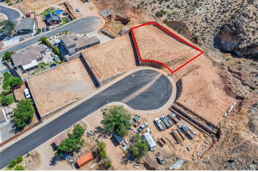 This 0.30-acre lot is part of four contiguous parcels, offering endless potential. It's the perfect place to build your dream home, surrounded by peaceful desert landscapes and breathtaking views. You also have the option to add an accessory dwelling unit (ADU) for additional living space or rental income. For builders and developers, these lots offer excellent investment potential and back up to an incredible ridgeline that enhances privacy and scenic value. With no HOA and the ability to bring your own builder, the possibilities are wide open. Located near Zion National Park, Sand Hollow, Warner Valley, sand dunes, and world-class outdoor recreation, this is a rare opportunity to create something truly special. Buyer/buyer agent is responsible for verifying all information.