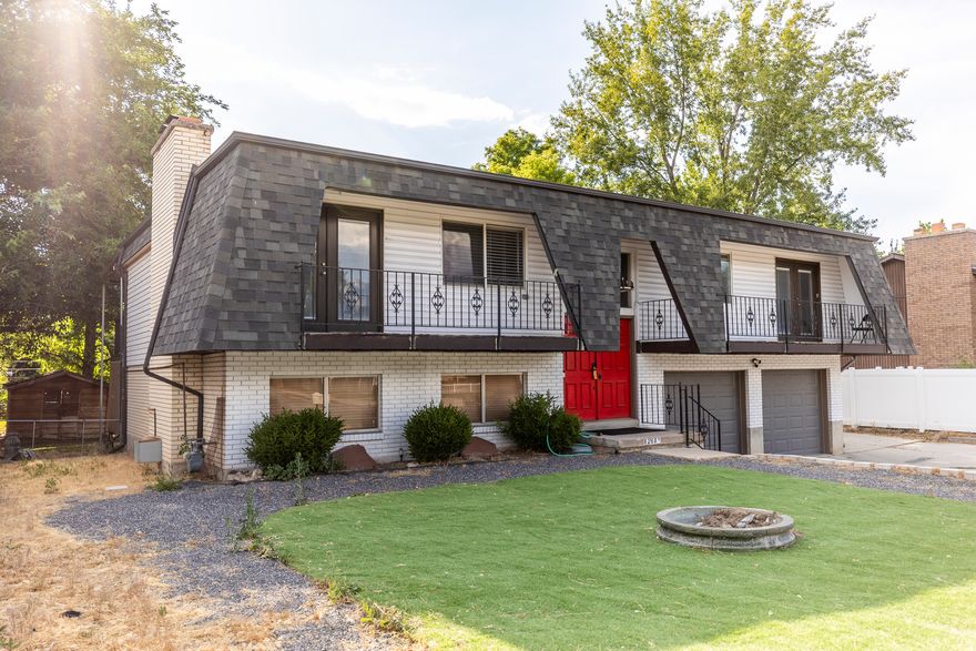Great Sandy Split Level. Large double door entryway to welcome you! This home is ready for its new owner. Enjoy breathtaking sunrises, and dramatic sunsets at this spacious Sandy home. Good amounts of updates to boast. Brand new roof & Rain Gutters April 22. New A/C and Furnace 2021. Fabulous farmhouse sink, newer countertops & proofing drawer for all the bakers out there. Newer flooring and carpet for the upstairs. Massive driveway to fit plenty of cars or even a full size RV. New garage door system & doors 2021! Run your business or store your boats and toys in the rarely found 28x30 detached garage/shop (heated and cooled). The multi-level redwood decks are a perfect place to entertain and watch those amazing sunsets. Hot tub out back, and sauna built into garage for ultimate comfort and relaxation.  Minutes from I-15, close to shopping, schools, and anything else you can imagine. Minutes from Big and Little Cottonwood Canyons, head West and you are only fifteen minutes to Salt Lake International Airport. Square footage figures are provided as a courtesy estimate only and were obtained from county records. Buyer is advised to obtain an independent measurement.