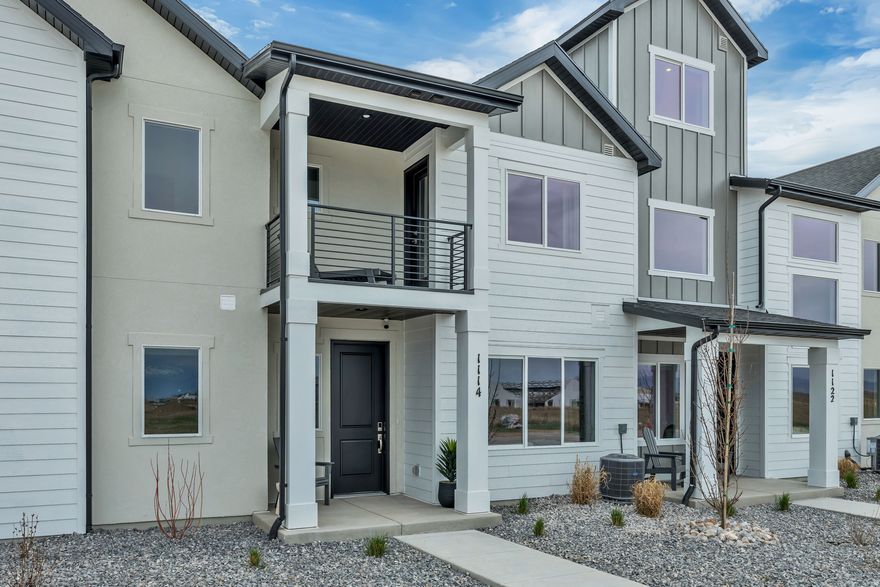 The Madison brings 1,5801,611 sq. ft. across two levels with 3 bedrooms and 2.5 baths. An open kitchen-to-dining-to-great room layout keeps everyone connected, while a large pantry streamlines meal prep and storage. A Spacious laundry and smart additional storage help reduce clutter. Step out to your deck for morning coffee or sunset wind-downs. A 2-car garage keeps gear, bikes, and bins neatly stowed. *Unit is currently under construction and pictures are of a finished home of the same floor plan, and the available home may contain different options, upgrades, and exterior color and/or elevation style. Square footage figures are provided as a courtesy estimate only and were obtained from building plans*