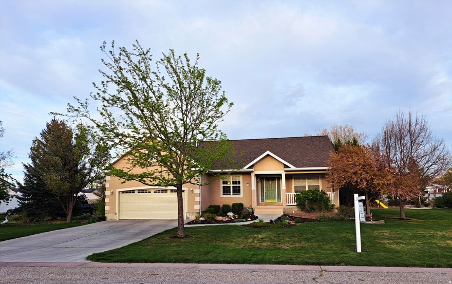 This beautiful home is located in a quiet cul-de-sac. It features two full kitchens-ideal for multi-generational living, guests, or rental potential. It boasts a fully landscaped yard for outdoor living, entertaining, or relaxing evenings at home. This lot is zoned to keep horses. Two water shares are available for purchase upon request.  Square footage figures are provided as a courtesy estimate only and were obtained from Tooele County.  Buyer is advised to obtain an independent measurement.