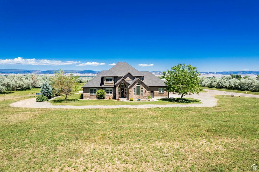 Seller willing to consider any reasonable offer. Discover luxury living with this exquisite 3703 sq. ft. property. This home is perfectly nestled on 10 sprawling acres, offering immaculate views and privacy. The master bedroom is conveniently located on the main level, features his and her walk-in closets, ensuring both comfort and functionality. Outdoor living is redefined with a walk-out patio allows you to enjoy the scenic surroundings and entertain guests in style. A massive 40x60 heated shop provides space for projects or storage.  Square footage figures are provided as a courtesy estimate only and were obtained from appraisal.  Buyer is advised to obtain an independent measurement.
