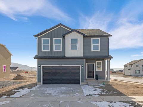 Photo of 2342 E WOODBURY LN #547, Eagle Mountain, UT 84005 (MLS # 2134210)