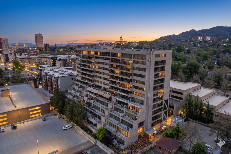 Whether you're looking for a personal sanctuary or a high-end investment to add to the portfolio, this 8th-floor gem at Governor's Plaza is the one. This remodeled unit is a total top-tier transformation. Clean, modern, and styled with an eye for detail that makes it feel like a custom model home. The first thing that hits you is the view. Being on the 8th floor with totally unobstructed southern views is a game-changer. You get the whole Salt Lake Valley spread out in front of you from the peaks of the Wasatch Mountains, the U of U, and the city skyline to the west. It's the kind of backdrop that never gets old, whether you're drinking coffee in the morning or hosting friends as the city lights kick on. The primary bedroom with the same great views also has a custom remodeled bathroom with a soaking tub and a steam shower. This property comes with two garage parking spots and a secure storage space and bike parking. One or more photos have been virtually staged/digitally enhanced to show potential. Figures are provided as a courtesy, buyer and buyers agent to verify all information.