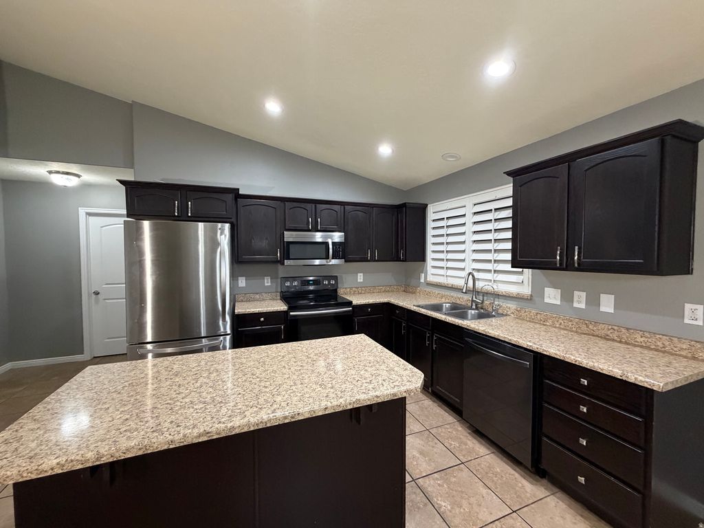 Photo of 6092 W HAVEN RIDGE WAY, West Valley City, UT 84128 (MLS # 2138772)