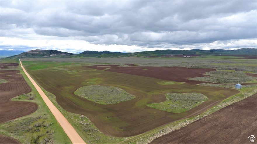 Located just off Ten Mile Pass in Soda Springs, this property offers both recreational and income producing opportunities.  310 acres are currently being dry farmed with a potential for an additional 100 tillable acres.  It has a history of share crop rotation between feed barley and wheat with an opportunity to continue the contract.  The property is subdivided into two adjacent parcels with road frontage on both south and west borders.  Indian Creek Road and Ten Mile Road provide seasonal access on well-maintained gravel roads. Hunting and fishing enthusiasts are drawn to this area for the abundant wildlife.  Lava rock reefs with sage and bitter brush provide ideal habitat for trophy mule deer.  Elk migration is heavy in this area, migrating from Tin Cup through Soda Springs near Government Dam Road.  Blackfoot, Alexander and Chesterfield Reservoir are close by, and the rainbow trout fishing is great.  Call the agents today to schedule a private tour.   2 separate adjacent parcels 318.83 acres and 319.51 acres   310 tillable acres currently farmed by a sharecropper  Additional 100 acres could be tilled and farmed  Mineral Rights  Seasonal access  Good genetics for trophy mule deer  Trophy hunting unit 72  Indian Creek is a seasonal creek that runs through part of the land