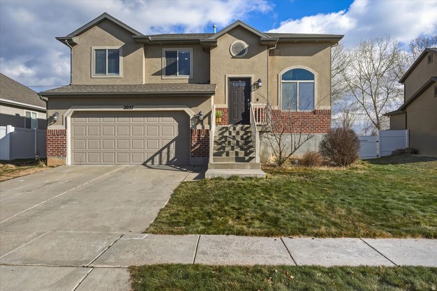 Don't miss this 2010-built home in the heart of Clearfield, Utah! This spacious residence offers four bedrooms and three full bathrooms, providing comfortable living for families of all sizes. Fresh new carpet throughout gives the home a clean, move-in-ready feel, read for its next owners.  The functional floor plan flows easily from room to room, complemented by a two-car garage for convenient parking and storage. Situated in a desirable neighborhood, the home enjoys a west-facing orientation-perfect for backyard shade on those hot summer nights-and a nicely sized yard ideal for relaxing, entertaining, or play.  Located close to schools, parks, shopping, and commuter routes, this property combines comfort, quality, and an outstanding location. Don't miss the opportunity to make this home your own!