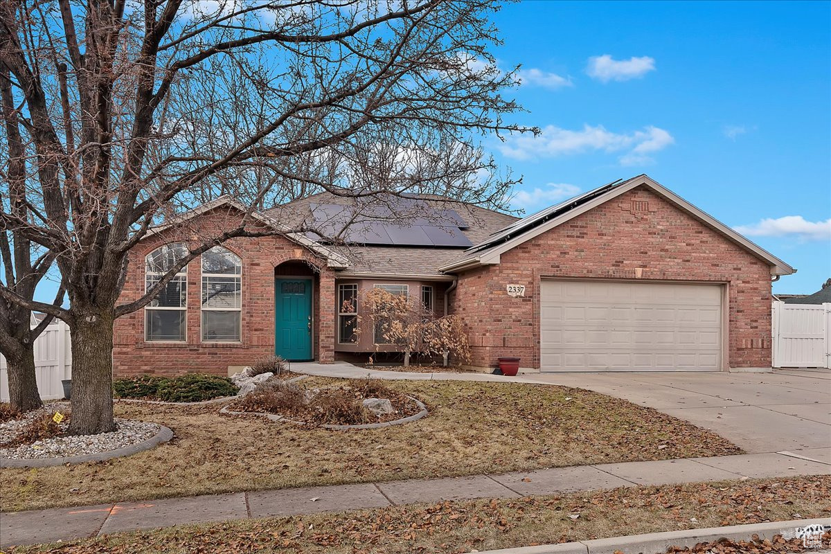 Discover the perfect blend of comfort and convenience in this stunning single-story home, ideal for those who cherish accessibility and modern living. Particularly, two primary bedrooms on the main floor each have their own en-suites, creating private sanctuaries within your own home.  Step through the doorway and be greeted by the warm hues of hardwood and tile flooring, illuminated by abundant natural light that makes every space feel welcoming. Granite countertops throughout the home add a refined touch, while the sensible layout includes large storage areas and essential amenities like a new furnace and air conditioning system with heat pump to ensure year-round comfort installed in September 2023 & 50-gallon water heater installed 2022. A special treat is the home office or den, fashioned with built-in bookshelves-it's an ideal spot for both productivity and reflection. For tech enthusiasts and telecommuters, high-speed fiber internet service is available to keep you connected.  Sustainability is key in this dwelling, equipped with 28 solar panels that not only reduce your carbon footprint but also power the dedicated 240-volt plug in the spacious garage for electric vehicles. Outside, the property does not disappoint with a beautifully landscaped yard and a back patio that calls for memorable gatherings or peaceful solitary moments.  Located in a serene, neighbor-friendly area, this home places you in the heart of convenience, with easy access to local amenities and a thriving community vibe.  This property isn't just a place to reside-it's a space to thrive and make lasting memories. Book your private showing today and step into a home that superbly caters to both comfort and modern lifestyle needs.