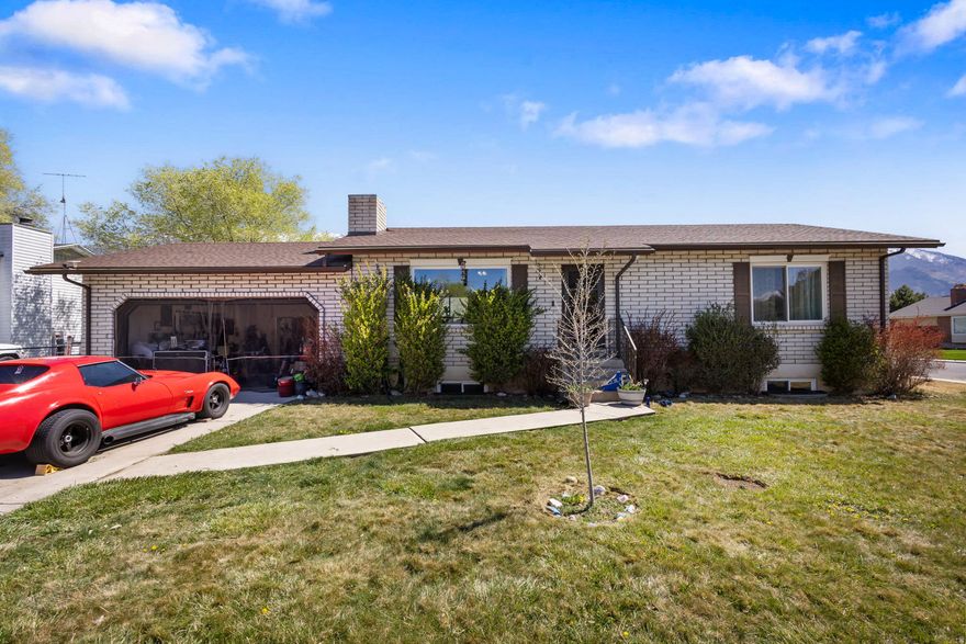 Beautiful corner-lot home in one of Provo's most established and convenient neighborhoods with no HOA. This well-maintained brick rambler offers a functional layout with generous living space and pride of ownership evident throughout.  The property features a spacious, fully fenced backyard with mature landscaping and plenty of room to enjoy. A standout feature is the flex workshop space located at the rear of the garage, thoughtfully conditioned for year-round use-ideal for hobbies, creative work, storage, or a personalized workspace.  Fully paid-off solar panels provide a major advantage, helping reduce energy costs and increasing long-term efficiency and value.  Located just minutes from BYU, UVU, shopping centers, dining, and with easy access to major routes, this home offers both convenience and strong long-term potential. Provo continues to see consistent demand, making this an excellent opportunity for both homeowners and investors.  This home is being featured on Utah Real Estate Essentials on ABC4, Telemundo, and Hulu Live TV.  A rare combination of location, versatility, and value-opportunities like this don't last.  Buyer to verify all information.