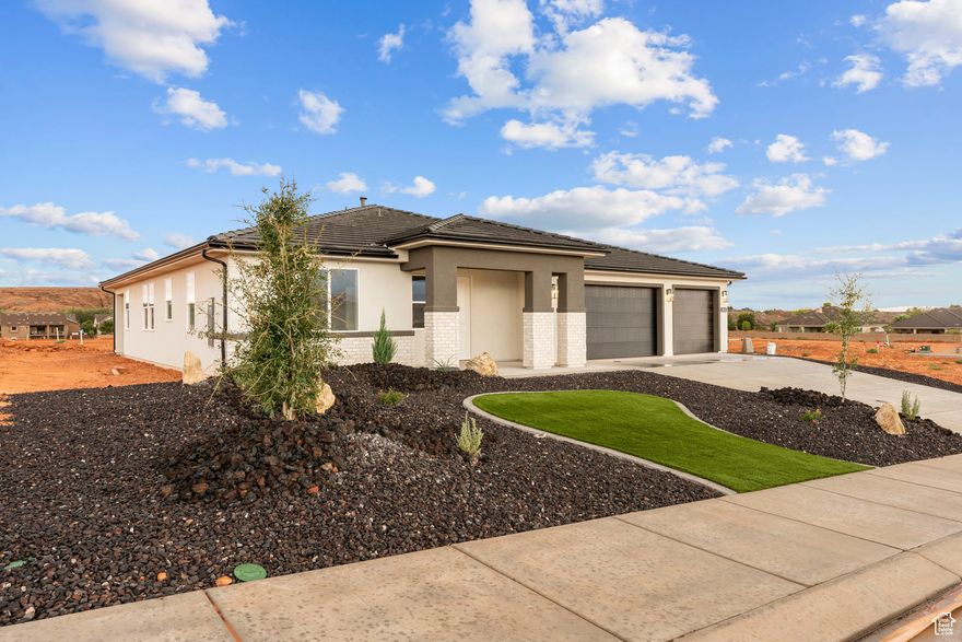 This beautiful 3-bedroom, 2.5-bathroom home in the scenic Sand Hollow area offers the perfect opportunity to own a thoughtfully designed residence by Holmes Homes. With modern finishes, open-concept living, and a 3-car garage, this home is ideal for full-time living, a second home, or a low-maintenance desert retreat. Located in the Dixie Heights community near Sand Hollow Reservoir, sand dunes, and award-winning golf, enjoy the best of Southern Utah's outdoor lifestyle-built just for you. This home was just completed! Call me for your private showing.