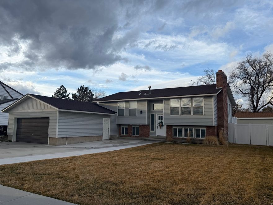 *No Showings until Open House Saturday from 1:00-3:00* Welcome home! This beautifully remodeled 5 bed, 3 bath home sits in a fantastic neighborhood and offers space, comfort, and modern upgrades throughout. The large open kitchen and spacious living room are perfect for small gatherings, everyday living and the private deck off the master suite is a rare luxury feature! Downstairs you'll find an upgraded basement kitchen with quartz countertops and stainless steel appliances along with an oversized basement living area great for entertaining or potential rental opportunities! Step outside on the large trex deck to enjoy mountain views and outdoor entertaining! The fully fenced vinyl backyard offers privacy and includes a large shed for tons of storage. With concrete patios and additional RV parking there's room for all your toys! This home truly has it all! Space, upgrades and a location you'll love! Square footage figures are provided as a courtesy estimate only and were obtained from county records. Buyer is advised to obtain an independent measurement.