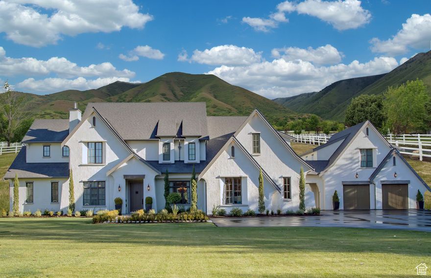 Build the home of your dreams with renowned Parade of Homes Builder, Lewis Contracting. The cost of the lot is $1,000,000. This includes the cost of finishing the cul de sac. The cost to construct the home shown starts at $1,444,320 including the finished basement. Total cost $2,444,320. The blue barn and the additional acreage around it can be included for an extra $400,000. Call today to schedule your personalized consultation. We offer a variety of house plans to suit your needs, can work with your own plans, or help you create a unique custom design that turns your vision into reality. Architectural Designs #270007AF.