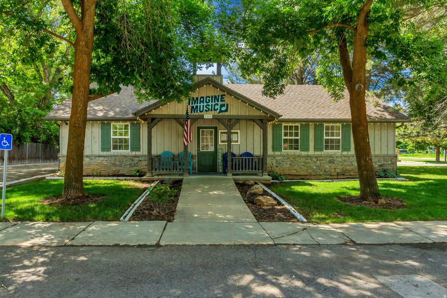 Rare opportunity in the heart of Huntsville to own a -acre mixed-use parcel with both residential and commercial zoning-a combination that is increasingly hard to find in the Ogden Valley. Originally built as Huntsville's Town Hall, this unique property has been thoughtfully updated and most recently operated as a boutique music school and event space. The existing structure offers immediate usability with a large open main room, dedicated office area, multiple private rooms, two half baths, and expansive basement storage. What truly sets this property apart is its flexibility. With its dual zoning designation, the next owner has the option to continue commercial use, create a live/work environment, or explore future residential conversion (buyer to verify all uses). The -acre lot is fully landscaped with mature trees, automatic sprinklers, and ample on-site parking both in front and behind the building-offering room for expansion, reconfiguration, or long-term redevelopment. Positioned in a prime central location within Huntsville and just minutes from the Snowbasin corridor, this property offers not only immediate functionality but also long-term upside in one of Northern Utah's most desirable and supply-constrained markets. Standalone, flexible-use properties like this rarely come available. Buyer to verify all information, zoning, and potential uses.