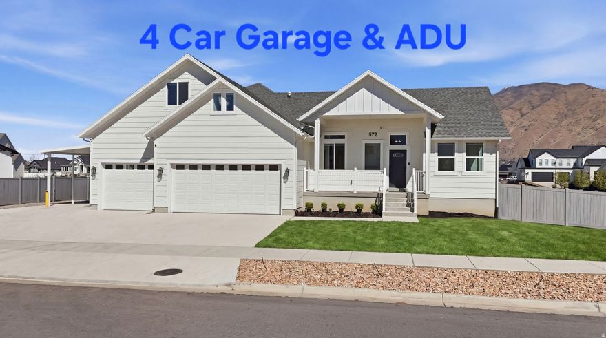 Price reduced! Luxurious remodel on this custom 2023 Rambler in Whiting Farms neighborhood!  6+ bedrooms, 6 baths on 1/2 acre with breathtaking mountain views, shop and generous parking. Private ADU above the garage includes carport and EV charger. Walkout daylight basement allows a multigenerational option. The main floor boasts a gourmet kitchen, vaults, fireplace, and 3-4 bedrooms - 2 en suites. Luxurious spa-like bath with large soaking tub.  Many more extras!