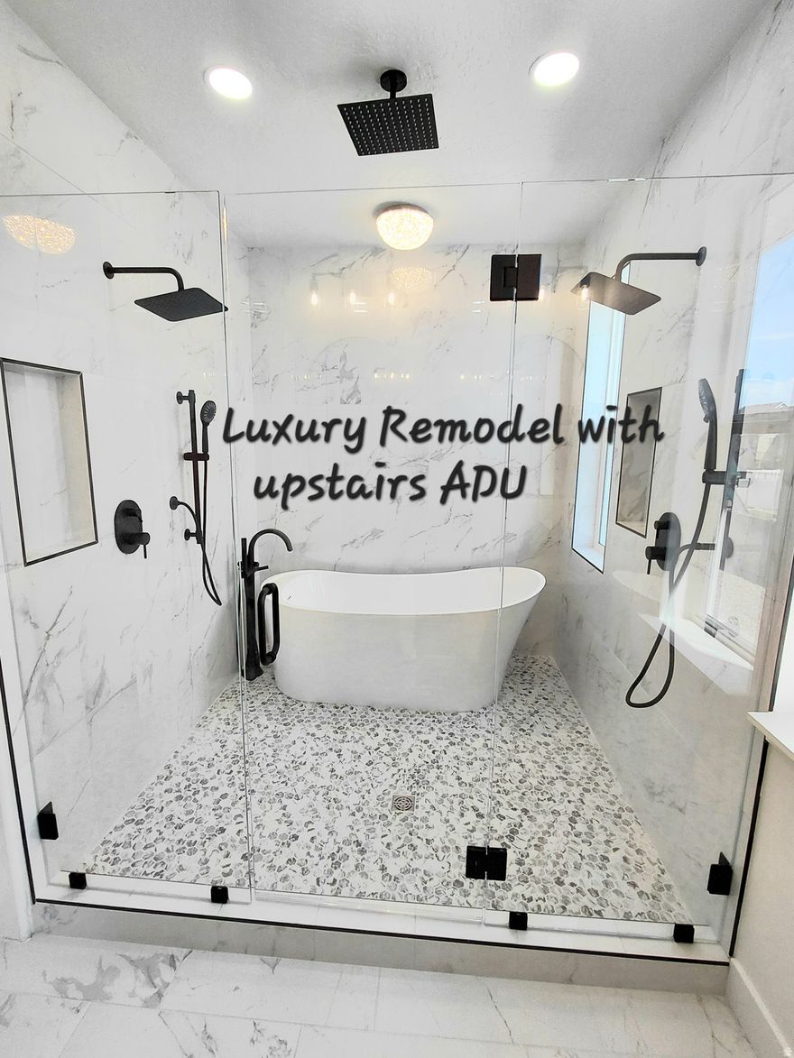 Luxurious remodel on this custom 2023 Rambler in Whiting Farms neighborhood!  6+ bedrooms, 6 baths on 1/2 acre with breathtaking mountain views, shop and generous parking. Private ADU above the garage includes carport and EV charger. Walkout daylight basement allows a multigenerational option. The main floor boasts a gourmet kitchen, vaults, fireplace, and 3-4 bedrooms - 2 en suites. Luxurious spa-like bath with large soaking tub.  Many more extras!