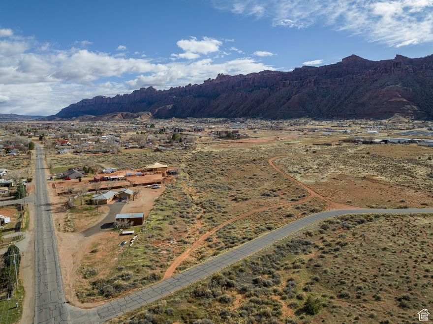 Exceptional Mixed-Use Development Opportunity in Moab, Utah  Discover the unmatched potential of this industrial subdivision, perfectly positioned on Resource Boulevard in Moab's thriving southern corridor. Offering an exclusive selection of 2-2.5-acre lots, this development presents a rare opportunity for a visionary blend of commercial, residential, or mixed-use projects.  Strategic Location: Nestled between HWY 191 and Spanish Valley Drive, and merely 3 miles from vibrant Downtown Moab, this subdivision offers unparalleled connectivity and accessibility. Its strategic position guarantees high visibility and easy access to major thoroughfares, making it a prime location for businesses and residences alike.  Ready for Development: The first four lots of this eight-lot subdivision are now available and fully improved, offering a turn-key solution for immediate development. With water, sewer, power, and telecom utilities already established, and impact fees for water and sewer settled, your path to development is clear.  Visionary Potential: Envision a dynamic community where businesses and homes coexist seamlessly, creating a thriving live-work-play environment. This subdivision is designed for versatility, accommodating innovative and sustainable development projects that can transform the Moab landscape.  Utility Details: All utility groundwork has been laid, with water and sewer impact fees paid, confirmed by the Grand Water & Sewer Service Agency. For inquiries about power and fiber optics, Rocky Mountain Power and Emery Telcom are at your service.  Invest in Moab's Future: Seize the opportunity to shape the future of Moab. With only four lots currently on the market and the rest earmarked for future release, this subdivision is not just a place to develop; it's a place to grow and prosper.  Act Now: Don't miss this exceptional opportunity to be a part of Moab's growth story.