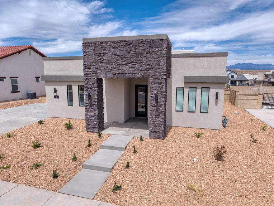 LIMITED INVENTORY + BUILDER INCENTIVES! ASK ABOUT UP TO $23K IN BUILDER & PREFERRED LENDER CREDITS TOWARD CLOSING COSTS OR RATE BUYDOWN. This beautiful newly completed home features the Eclipse DM floor plan, thoughtfully designed and built by Carefree Homes--Southern Utah's trusted builder. Carefree delivers service that exceeds our home buyers expectations before, during and after the sale! Conveniently located near major highways and just minutes from exciting new commercial developments, this home is perfect for both work and leisure. Highlights include durable 2x6 construction, stylish 2'' faux wood blinds, epoxy-coated garage floors, a fully landscaped yard, quartz/granite countertops, and soft close drawers. Nestled within a vibrant and growing community, you'll enjoy a wealth of amenities right at your doorstep, including a state-of-the-art lagoon and all year long heated pool with several pickleball courts, perfect for outdoor fun and relaxation with family, friends and neighbors. Call today for a showing or for more information about Southern Utah's unique community, Desert Color.