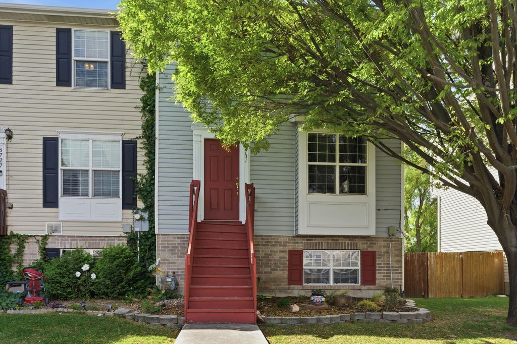 Photo of 5731 W KINTAIL CT, West Valley City, UT 84128 (MLS # 2152363)