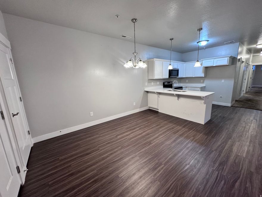 An incredible value-add opportunity awaits! While this main-level condo requires some work, it offers exceptional upside for the buyer with vision. This unit already features quartz countertops, laminate flooring, and plush carpet in all bedrooms. A fantastic addition to any investment portfolio!
