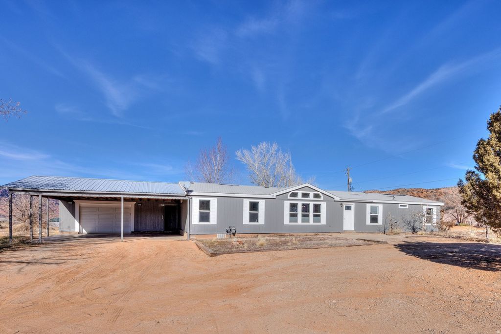 Photo of 55 E MOUNT PEALE DR, Moab, UT 84532 (MLS # 2136299)