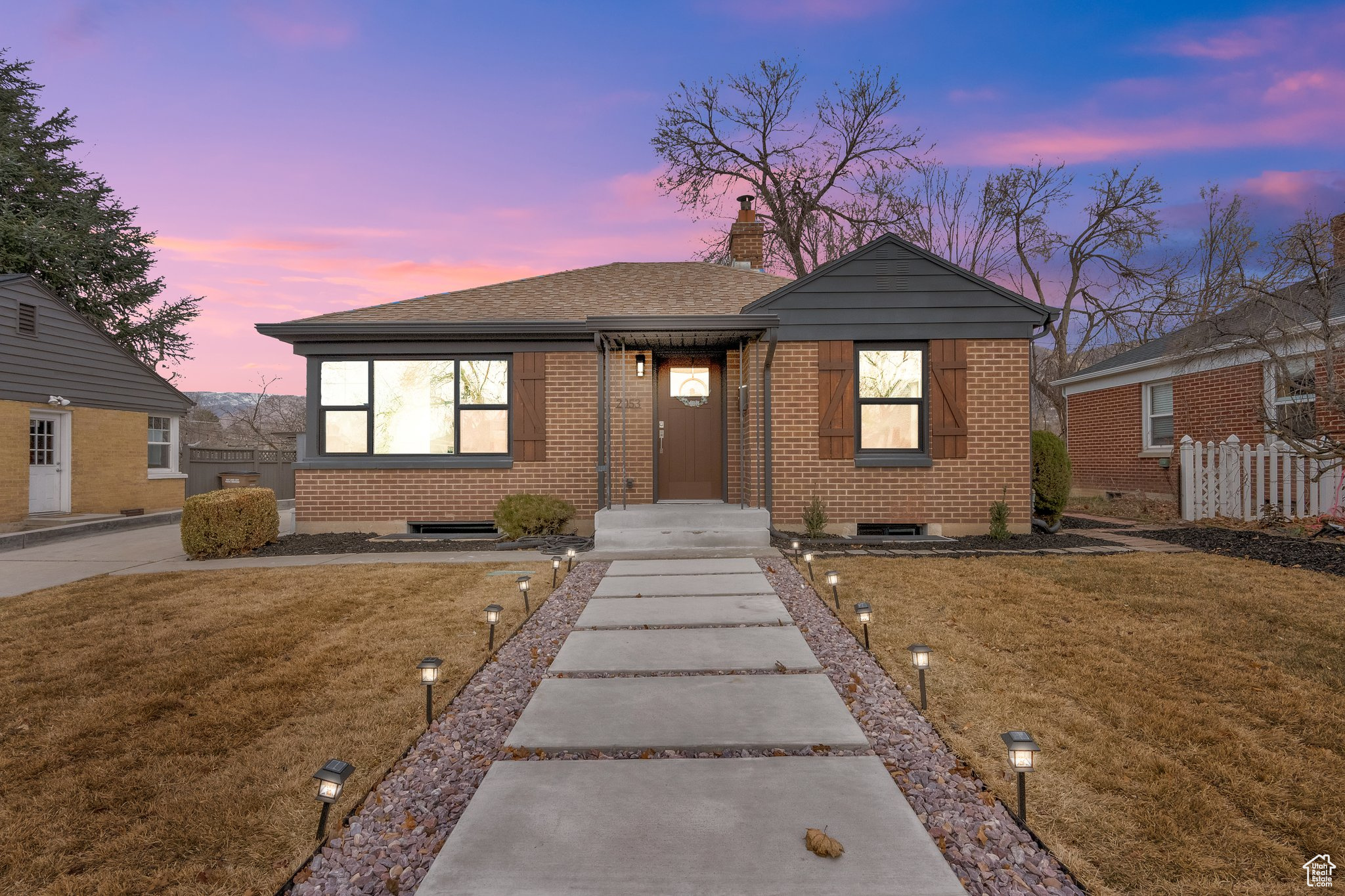 Step into your dream, one of a kind, timeless Stratford home. This renovated property boasts premium double-paned craftsman windows, 60 inch electric fireplace, laminate flooring, tiled bathrooms, and custom Americana cabinets. Luxury upgrades include: quartz waterfall countertops, stainless steel appliances with WIFI enabled smart refrigerator, custom lattice and trellis exterior woodwork, and meticulous landscaping  (fresh sod November 2024, custom cement approach, and new automatic sprinkling system). Choose to use the complete basement unit with separate entrance as an air bnb during ski season, a rental for extra cash, or an ideal set up for visiting family. Explore your creativity with additional square footage for hobbies in the heated wood shop and the bonus room below the garage, ready for your home gym, separate office, or art studio. Entertain friends & guests outside with the lighted covered deck, while enjoying spectacular mountain views. Less than 5 min away from Sugarhouse park, the Salt Lake Tennis club, and the Country Club golf course, with Parley's running & bike trail in your backyard. Ideally located for easy access to I-80 and a quick commute anywhere (10 min to University of Utah, 15 min to downtown Salt Lake, 15 min to airport, and 30 min to Park City).  Make this your future home!