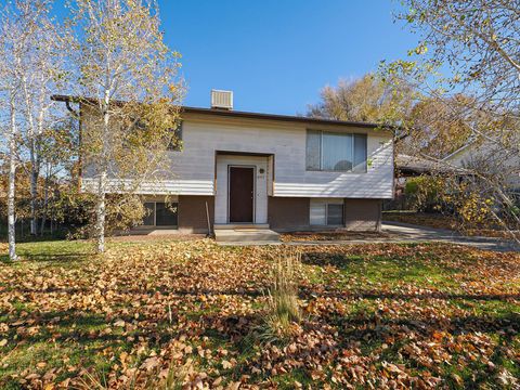 Photo of 4393 S WORMWOOD DR, West Valley City, UT 84120 (MLS # 2122909)