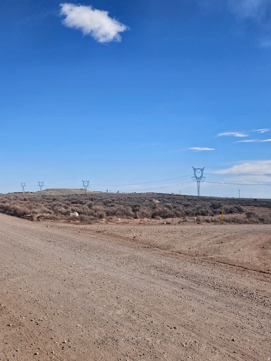 5 acres with owner financing option. Flat usable land. Power lines available to connect to at buyers expense. Surveyed. Site assessment test passed. Year round access! Directions Go East at 3575 S 3.5 miles. At the y go left.