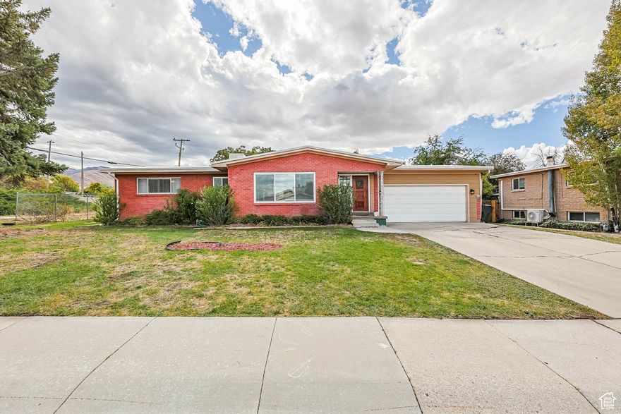 Welcome to this nicely updated Tooele rambler tucked away in a quiet neighborhood, with the mountains providing a beautiful backdrop. Sitting on a generous corner lot of 1/3 acre, the property offers backyard access through a utility easement.  Inside, you'll love the warmth of original hardwood floors in the two upstairs bedrooms, while the main family room and hall has been upgraded with durable LVP flooring. The dining area fits a nice size table and also features a cozy breakfast bar, and the bathrooms have been tastefully updated.  Downstairs, enjoy movie nights by the fireplace in the family room. With some unfinished space still available downstairs, you have the opportunity to create additional bedrooms, a home office, craft room, or more - tailored to your needs.  This home combines charm, functionality, and potential  - all in a peaceful setting with mountain views. Don't miss the chance to make it yours!   Square footage figures are provided as a courtesy estimate only and were obtained from County Records. Buyer and Buyers Agent are advised to obtain an independent measurement and verify all information. Please Allow 2 hr notice for showings