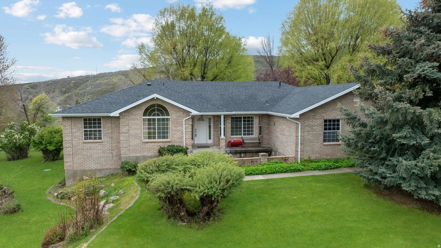 Remarkable property offering the perfect blend of country living and modern comfort. Nestled on 3.84 fully fenced acres in one of Utah's most sought-after communities, this home is a rare opportunity for those seeking space, privacy, and versatility. Step inside to a thoughtfully updated interior featuring a beautifully remodeled kitchen with granite countertops, ideal for the home chef, and a spacious primary suite complete with a large walk-in closet. The large basement family room with a full second kitchen creates an entertainer's dream and is perfectly suited for multi-generational living or hosting guests in style. Outside, the fully fenced 3.84 acres is ready for horses, livestock, or simply enjoying wide-open space, complemented by an impressive 2,100 sq ft barn perfect for equipment, animals, a workshop, or hobby use - all situated in the heart of Midway just minutes from Homestead Crater, Soldier Hollow, and world-class skiing at Deer Valley and Park City.  .This property is priced to reflect a needed foundation lift (contractor bid approximately $68,000), see attached bid. New roof in 2024. New Carpet! Square feet as per appraisal.  Buyer and Buyer's Broker to verify all information including square footage and acreage.