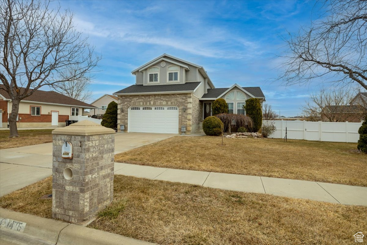 This great home is located in one of the most sought-after neighborhoods in Syracuse. It offers a great layout with plenty of room for hosting and entertaining. Three bedrooms, including the primary bedroom, are located on the upper level. The primary bedroom includes a spacious, well-lit walk-in closet and an attached primary bathroom including a separate tub/shower. The finished basement includes a full kitchen, one bedroom, one updated bathroom and a family room with lots of storage areas. The backyard will have great shade at night since the home is west-facing and also includes a covered trex deck. Enjoy a beautiful built in BBQ grill space and a very useable storage shed! This home has great bones in a great area with tons of potential to make it your own. Listing information to the best of our knowledge, it is the buyer's responsibility to verify information.  Square footage figures are provided as a courtesy estimate only and were obtained from county records.  Buyer is advised to obtain an independent measurement.