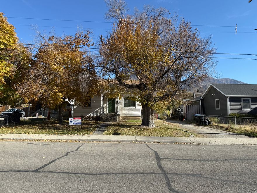 INSTANT EQUITY OPPORTUNITY!! This house is being sold below market value! This cute home in a prime Provo location has lovely original hardwood floors, and a remodeled kitchen with stainless appliances and exposed brick. The basement is fully finished with a nicely appointed full bathroom. The house is in good condition  but is being offer at a discount to compensate for some minor cosmetic items (carpet/paint) and because the seller would like a quick closing before the end of the year. The home is being sold AS-IS. The garage has electricity and is wired for an opener, but is currently only used as storage. Upright freezer in basement is included! Here is your opportunity to get a great deal!   Square footage figures are provided as a courtesy estimate only and were obtained from county records .  Buyer is advised to obtain an independent measurement.