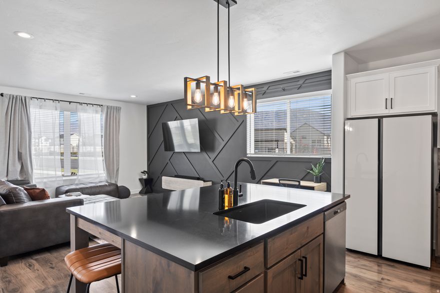 Wake up to mountain views in this well-appointed American Fork townhome. Corner lot, granite countertops, open great room, and a patio made for relaxed evenings. Community pool, pickleball, and playground steps away. Furniture negotiable. Agent owned. Must have approved showing.