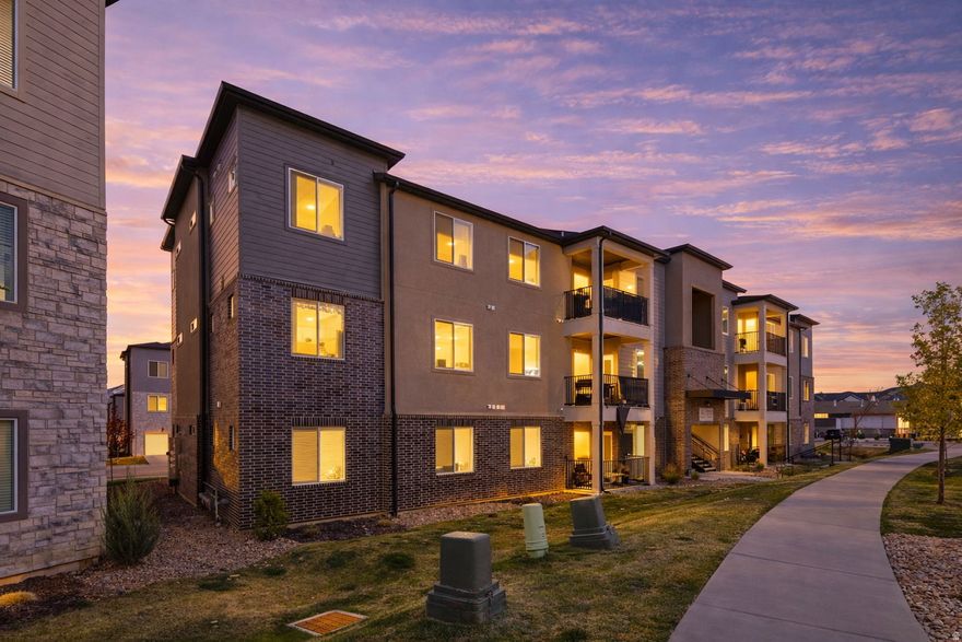 Prime location in Mountain Ridge Riverton, directly across from clubhouse, pool and fitness center. Updated top floor 3rd level condo with modern fixtures, upgraded lighting, vaulted ceilings and abundant natural light. 3 bed, 2 bath, 1,265 sqft built in 2023 with quartz countertops, stainless steel appliances, detached garage and private balcony.  Minutes from Mountain View Village, shopping and dining, with quick access to Bangerter Hwy and Mountain View Corridor. Community includes pool, clubhouse, gym, park, walking trails and pickleball. Low maintenance living in a high demand location.