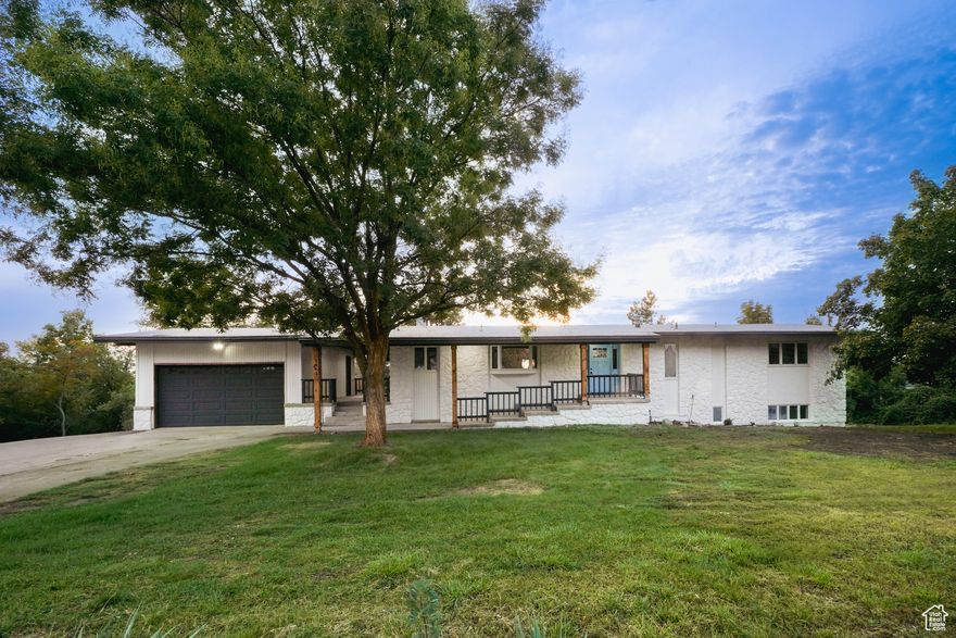 Welcome to this fully renovated home on a rare .614-acre lot in the heart of Centerville. Featuring brand new kitchen, bathrooms, flooring, carpet, paint, and countertops, this spacious property offers modern upgrades throughout. The basement includes a mother-in-law apartment, providing flexibility for extended family or rental potential. Enjoy breathtaking views with mountains in the front and an incredible backyard overlooking the valley. Conveniently located with easy access to world-class skiing, mountain biking, hiking, and more, this home also sits within an excellent school district. Opportunities like this are rare in Centerville-don't miss it! Square footage figures are provided as a courtesy estimate only and were obtained from county records. Buyer is advised to obtain an independent measurement.