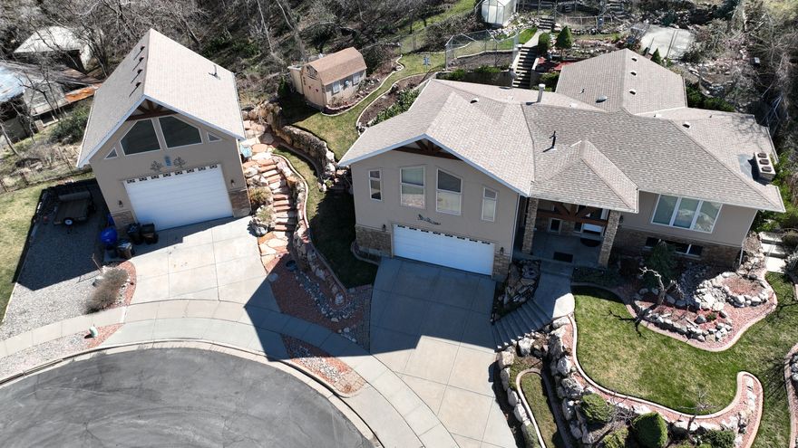 This house is located on the east bench of Bountiful with incredible views of the valley and the lake.  Located on a cul-de-sac for low traffic and noise.  Very secluded house with lots of features that cannot be listed in the listing.  This house has an additional detached RV garage with 750 sq ft and with a loft above it with a half bath totaling additional 750 sq ft.   It also has shares  the incredible views of the lake and valley. Has its own separate heating and air. Main house has two furnaces and AC's.  Also has a separate patio with the beautiful views on one of the terraces in the backyard.  Owner has a flower garden for each season.  This house has everything you would need for entertaining and enjoying the privacy and relaxation that comes with this property.  BRAND NEW CARPET AND FLOORING. Square footage is taken from the blueprints from the addition that was approved and signed off by the city.  Buyer to verify the square footage with their due diligence.  You will fall in love with this property