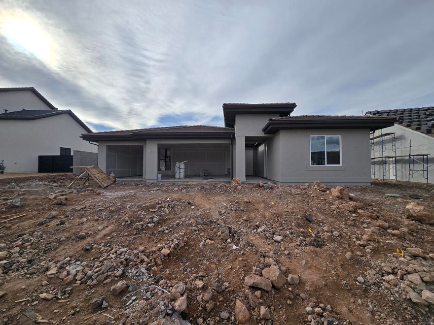 Discover your dream home at Fire Rock, a stunning new D.R Horton community in Hurricane, UT! Explore the ''Oasis'' floorplan Including a private casita and the best part? NO HOA. Single Level Living featuring 4 bedrooms, 3rd car garage, and a private casita with a bedroom, and washer/dryer hookups. Perfect space to use as a rental or for hosting family/friends. Estimated completion January 2026. Ask me about our generous home warranty & $$$$ towards closing costs when using our in-house lender DHI Mortgage. Improving quality of life here with its prime location, Fire Rock is truly a gem. Don't miss out on the opportunity to make it your own.