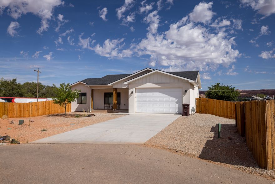 Come check out this amazing rambler with tons of space, many upgrades, and views of Moab Rim and the majestic La Sal Mountain Range.  9 foot ceilings on the main level, 8 foot garage height to fit taller cars, granite counter tops, LVP flooring throughout, huge family room downstairs, 5 bedrooms, 3 full bathrooms, and its on a quiet cul-de-sac. Built in 2021 and still looking brand new.  This would be a outstanding home for a family or a second home to come visit and play here in Moab. Furniture negotiable as well.
