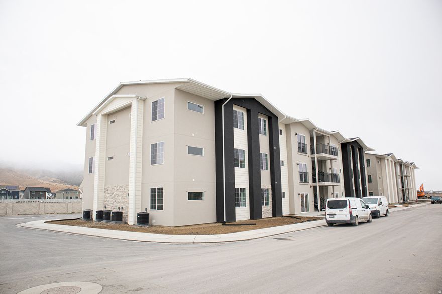 AMAZING 4.99% interest rate or $5,000 INCENTIVE towards closing costs, rate buydown, or price reduction regardless of lender! Plus, this home qualifies for Utah's First-Time Homebuyer Program-giving you up to AN ADDITIONAL $20,000 for down payment, closing costs, or interest rate buydown! (Talk to agent for details.) Must-see Harmony Community in Eagle Mountain! This beautiful condominium built by Flagship Homes features a 9' ceiling, 3 bedrooms, 2 bathrooms, quartz slab countertops, painted cabinets, laminate flooring, 1 car garage with additional parking, and full landscaping. The primary bedroom has a walk-in closet. This condominium will be ready around Christmas. Call for more information or stop by our model home at 1546 E. Starling Lane, Eagle Mountain for a tour. Model home hours: Monday-Saturday 11 AM - 6 PM. Buyers to verify all information. Square footage is from house plans.